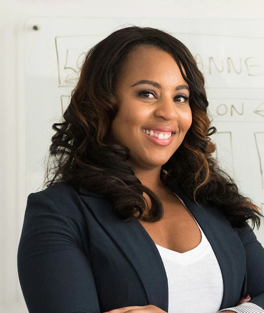 Woman with dark curly hair