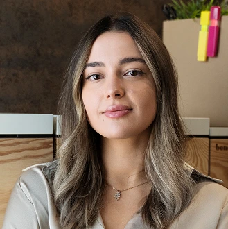 A beautiful woman in a golden blouse